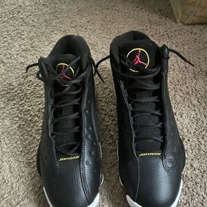 Jordan Black Sneakers with Red and Yellow Accents